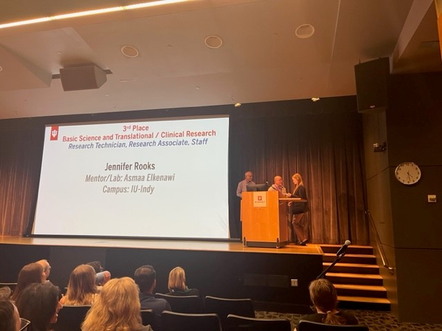 Jenny receiving poster award